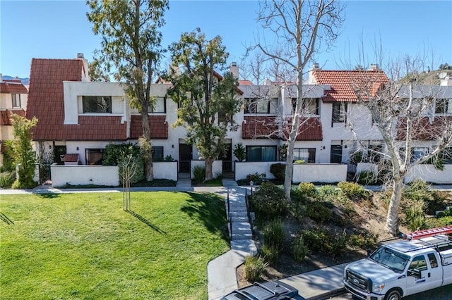 27666 Nugget Dr Unit 3, Canyon Country, CA 91387 - view of building exterior with a residential view