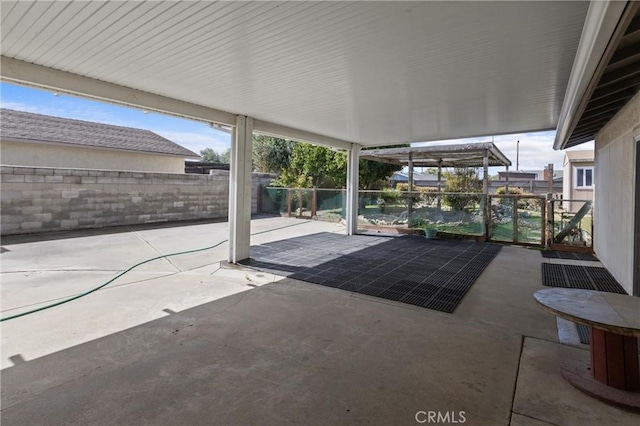 view of patio with fence