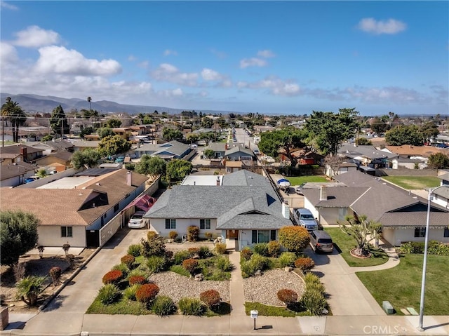 bird's eye view with a residential view and a mountain view