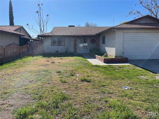 ranch-style house with stucco siding, a front lawn, a garage, and fence