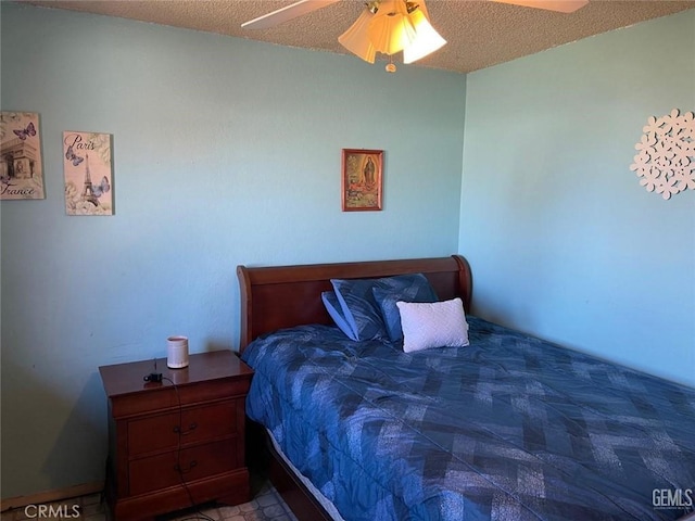 bedroom featuring a textured ceiling