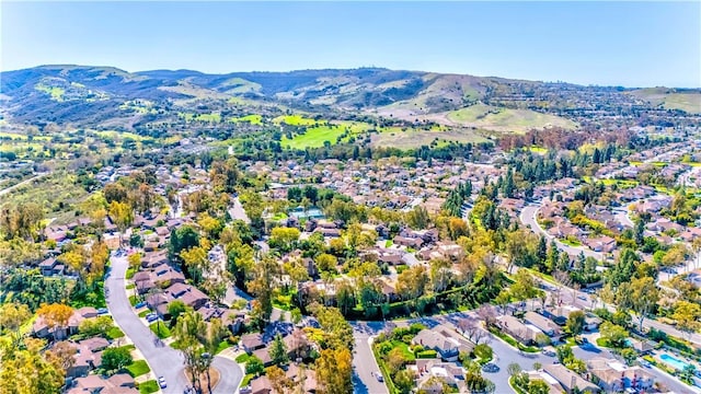 aerial view featuring a mountain view and a residential view