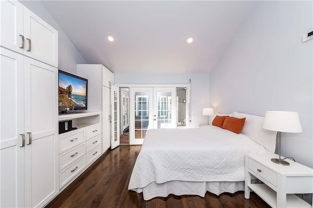 bedroom with dark wood-style floors, recessed lighting, french doors, and vaulted ceiling