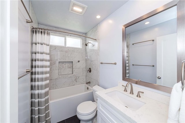 full bathroom featuring toilet, vanity, and shower / bathtub combination with curtain