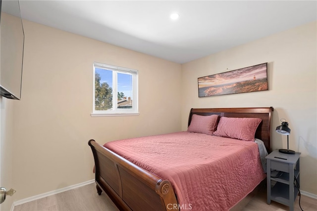 bedroom featuring baseboards