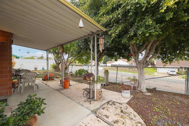 view of patio / terrace with outdoor dining area and a fenced backyard