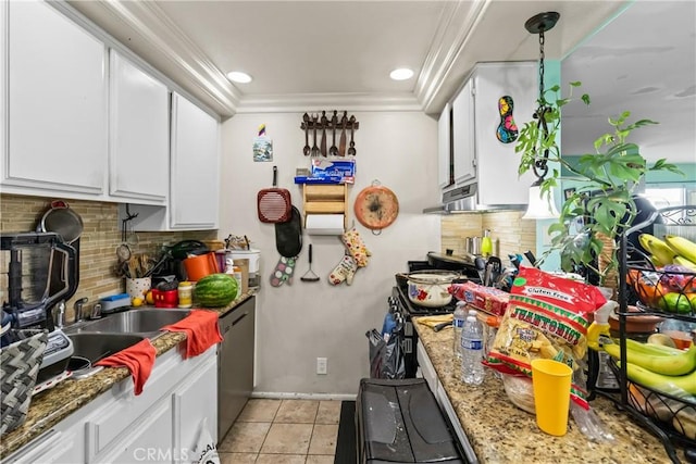 kitchen with light tile patterned floors, dishwasher, ornamental molding, and white cabinets