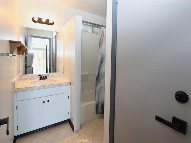 full bath with vanity, tile patterned floors, and shower / bath combination with curtain