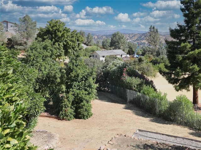 view of yard with a mountain view