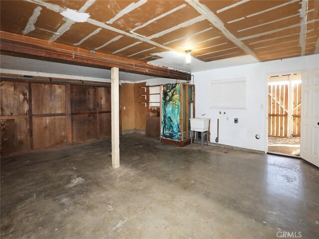 unfinished basement with a sink