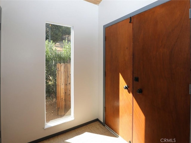 doorway with baseboards