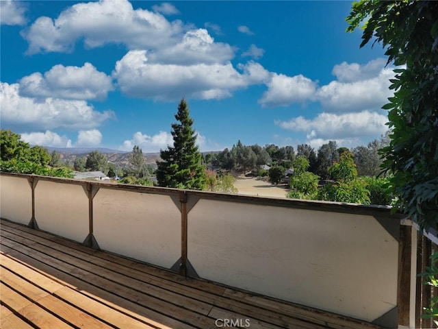 wooden terrace with a mountain view