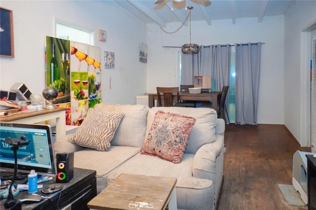 living room with beam ceiling, wood finished floors, and a ceiling fan