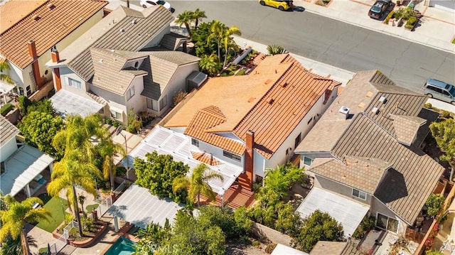 birds eye view of property with a residential view