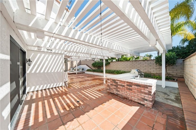 view of patio featuring a grill, a pergola, and a fenced backyard