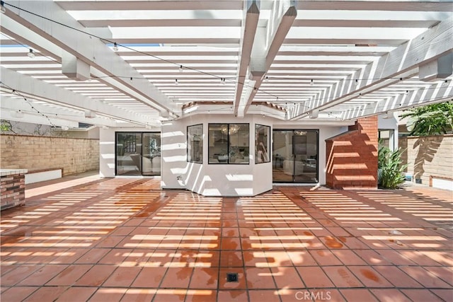 exterior space featuring fence and a pergola