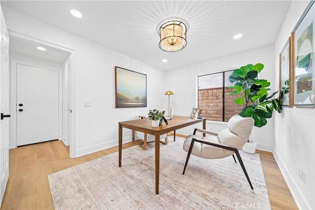 office space with recessed lighting, baseboards, and light wood-style floors