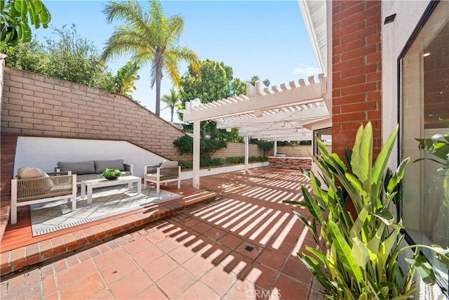 view of patio with a pergola, outdoor lounge area, and a fenced backyard