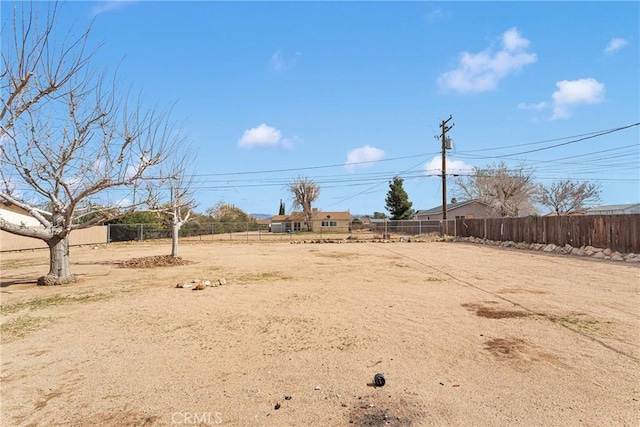 view of yard featuring fence