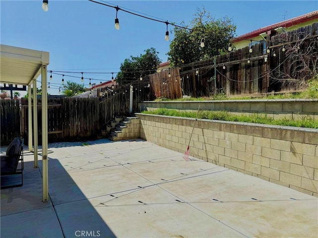 view of patio / terrace featuring a fenced backyard