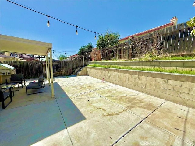 view of patio / terrace featuring a fenced backyard