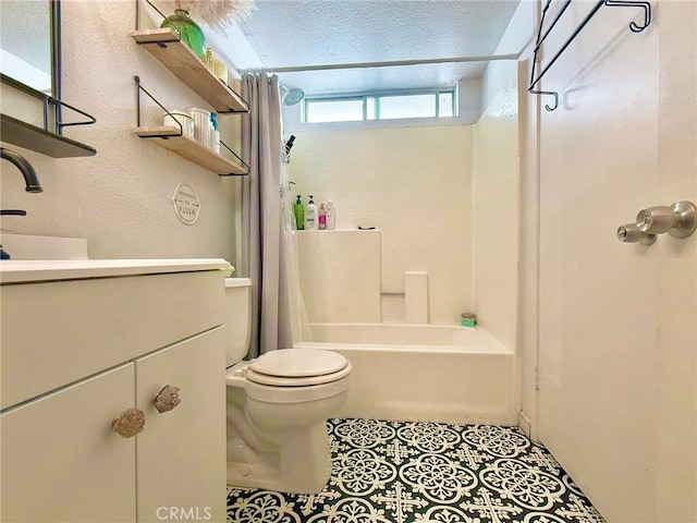 full bathroom featuring tile patterned flooring, toilet, vanity, a textured ceiling, and shower / bathtub combination with curtain