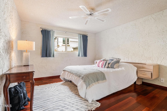 5451 Reef Way, Oxnard, CA 93035 - bedroom with a textured wall, a textured ceiling, wood finished floors, and a ceiling fan