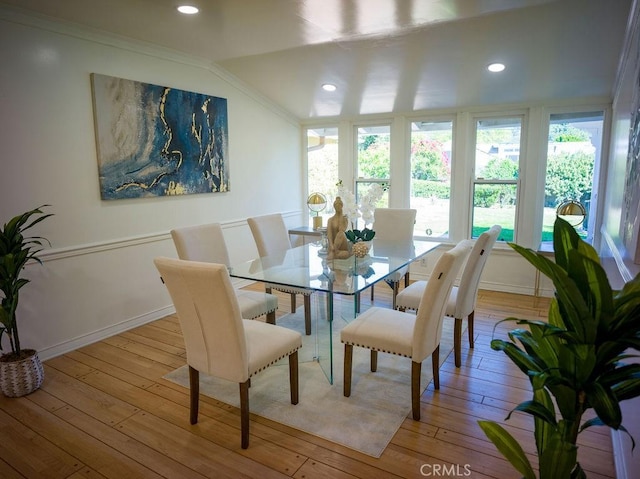 dining space with recessed lighting, plenty of natural light, and light wood-style flooring