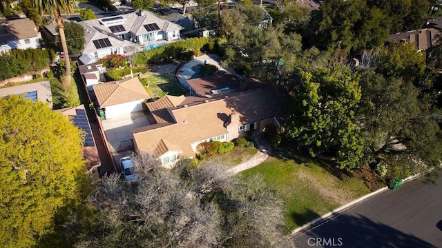 birds eye view of property with a residential view