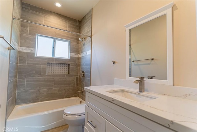 full bathroom with recessed lighting, vanity, toilet, and shower / bathing tub combination