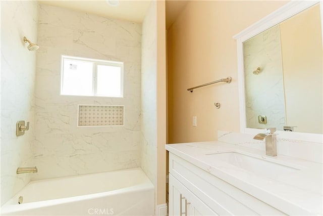 full bath featuring vanity and bathing tub / shower combination