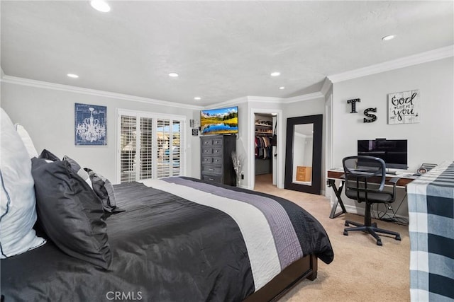 bedroom with a spacious closet, light colored carpet, ornamental molding, recessed lighting, and a closet