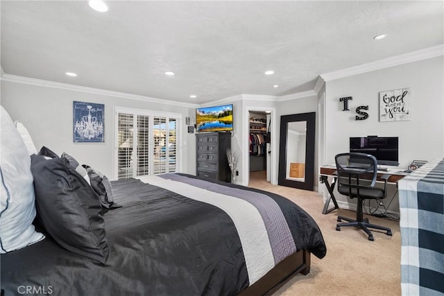 bedroom featuring light carpet, baseboards, a spacious closet, recessed lighting, and ornamental molding