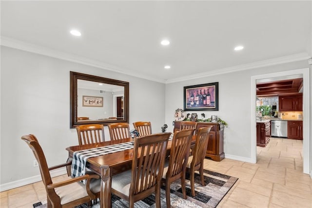 dining area with crown molding, recessed lighting, baseboards, and stone tile flooring