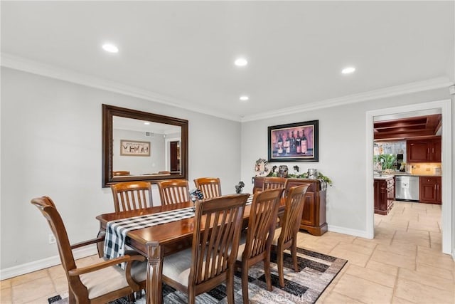 dining space with baseboards, stone tile flooring, crown molding, and recessed lighting