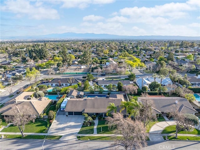 aerial view with a residential view and a mountain view