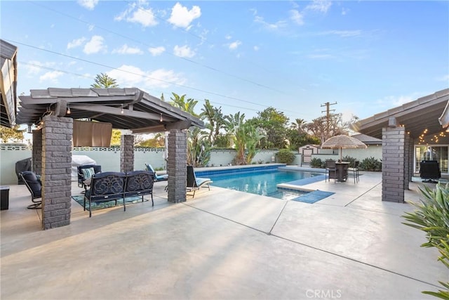 view of swimming pool with outdoor lounge area, a fenced in pool, a fenced backyard, outdoor dining area, and a patio