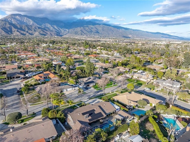 birds eye view of property with a residential view and a mountain view