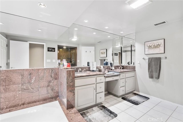 full bath featuring vanity, visible vents, recessed lighting, tile patterned flooring, and a bath