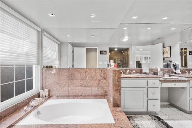 bathroom with recessed lighting, tile patterned flooring, a shower, a bath, and vanity