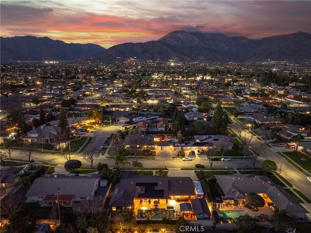 aerial view with a mountain view and a residential view