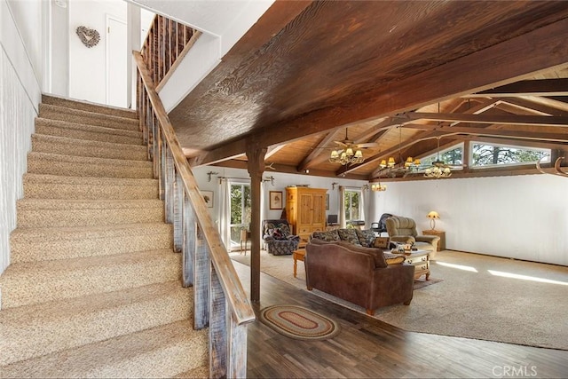 stairway featuring a ceiling fan, wood ceiling, vaulted ceiling with beams, and wood finished floors