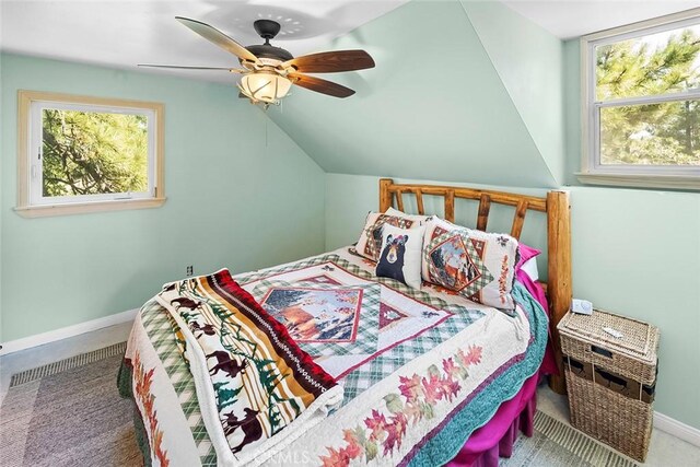 bedroom featuring baseboards, carpet, lofted ceiling, and a ceiling fan