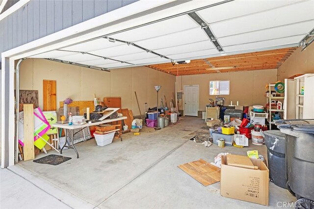 garage featuring a garage door opener