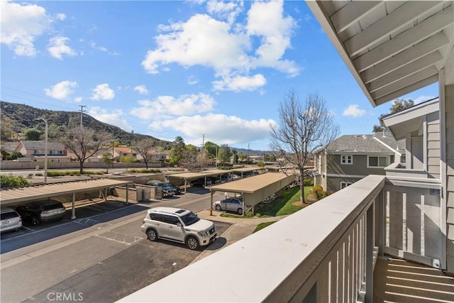 balcony featuring a mountain view