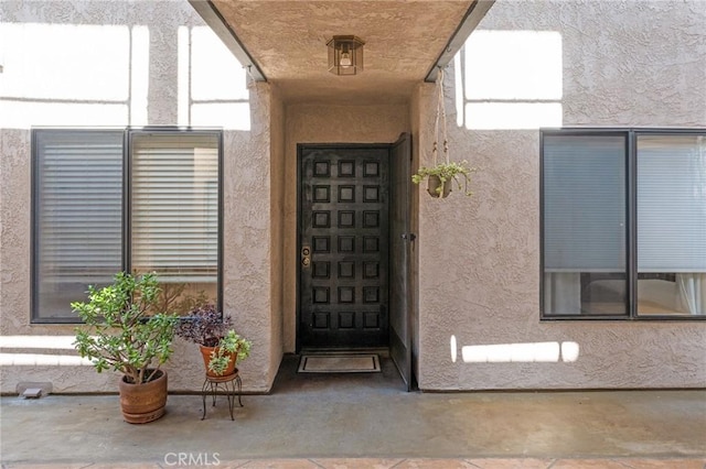 2032 E Bermuda St Unit 102, Long Beach, CA 90814 - doorway to property featuring stucco siding