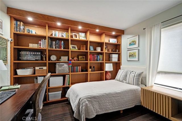 bedroom with radiator heating unit, recessed lighting, and dark wood-type flooring