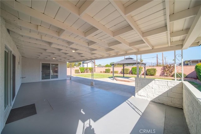 view of patio / terrace featuring a gazebo and a fenced backyard