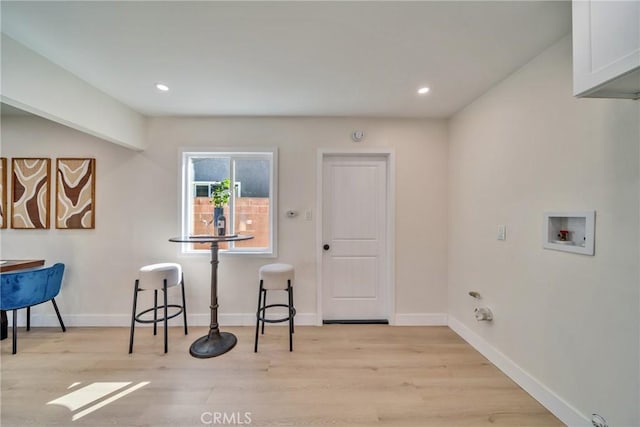interior space with recessed lighting, light wood-style floors, and baseboards