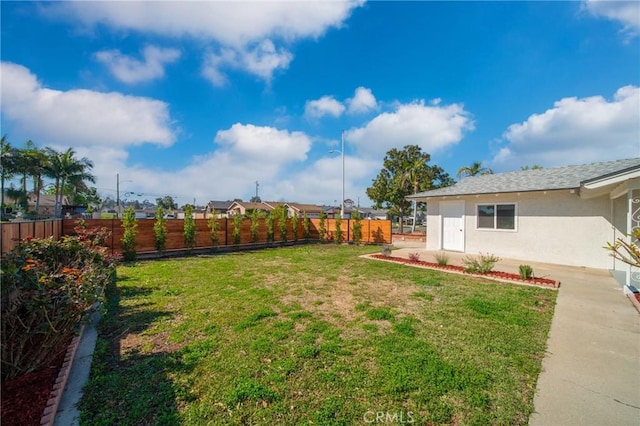 view of yard with fence